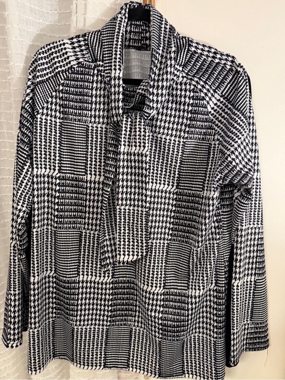 Elegant Black & White Silky Houndstooth Turtleneck with attached Tie Detail
